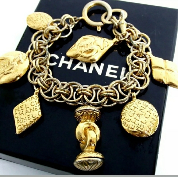 Jewelry - AUTH CHANEL LOGO ICON  VINTAGE BLE RUBBED T METAL